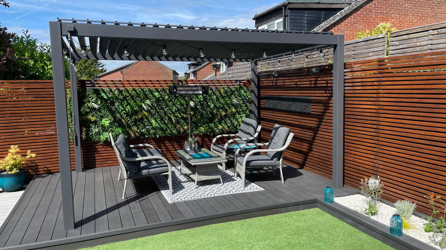 anthracite / dark grey pergola showcasing seating area